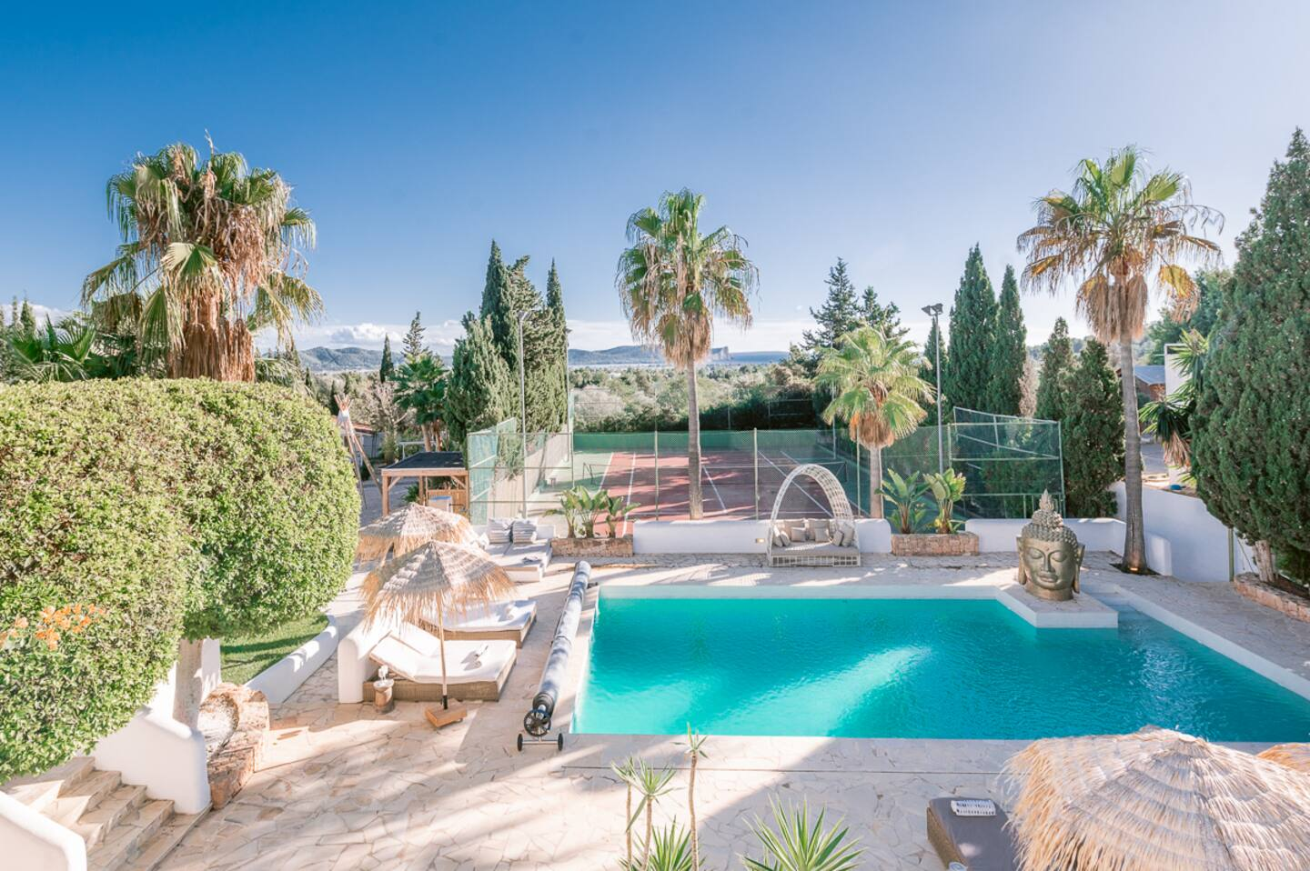 Ibiza villa pool, palm trees and tennis court